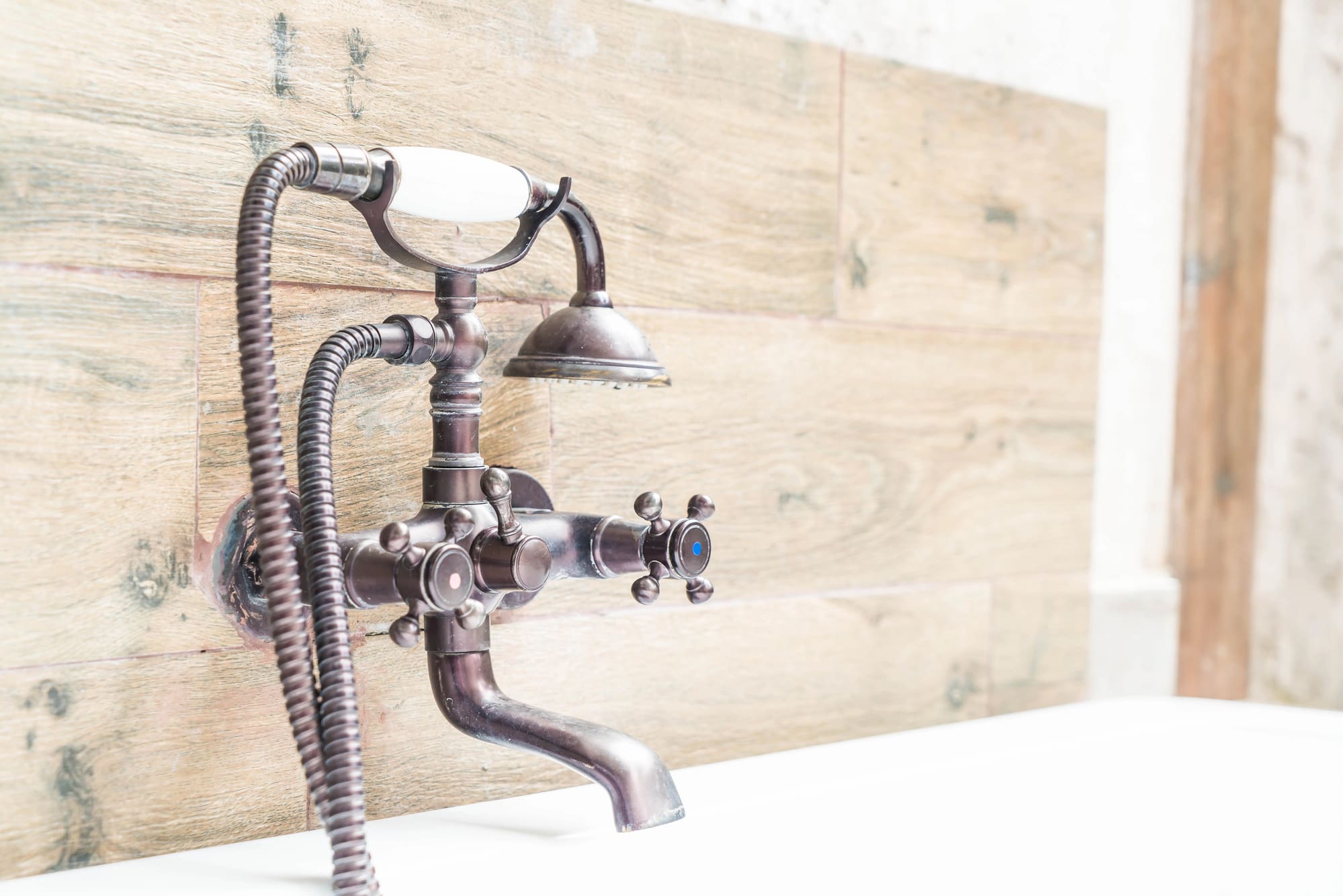 Backflow repair San Francisco for historic homes with vintage plumbing fixtures like this bronze bathtub faucet