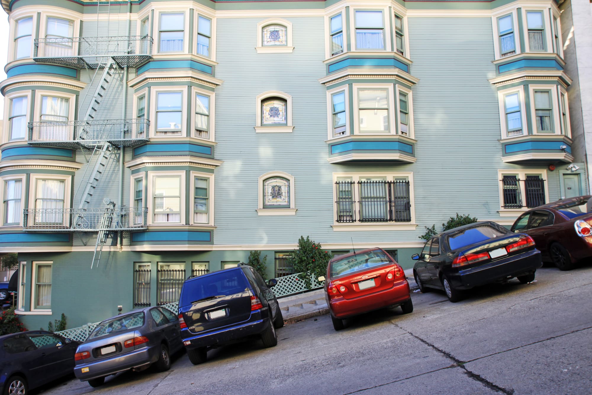 24-hour plumber San Francisco services classic Victorian apartment building on steep hill